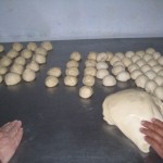 Challenge:  Cooking.  Discovery:  My host mother, Anita, and I made bread together.  Another traveler joined us. Can you see the quality of Anita's bread on the right vs. our two lumpy piles in the middle and left?