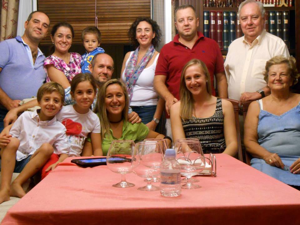 Posing with my host parents and their family after a typical, Saturday night dinner. 